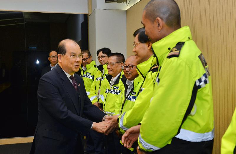 The Chief Secretary for Administration, Mr Matthew Cheung Kin-chung (first left), is pictured today (January 2) meeting security guards of Central Government Offices (CGO) to thank them for their dedication and professionalism in assisting to maintain order at CGO. 

He also expressed concern over two security guards injured while carrying out duties in the East Wing Forecourt of CGO yesterday (January 1) and wished them a rapid recovery.
