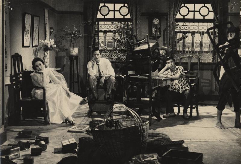 To mark the start of the Year of the Dog, the Hong Kong Film Archive of the Leisure and Cultural Services Department will present the programme "It's a Material World" from February 2 to 11, screening six comedies themed on money and wealth. Photo shows a film still of "The Chair" (1959).