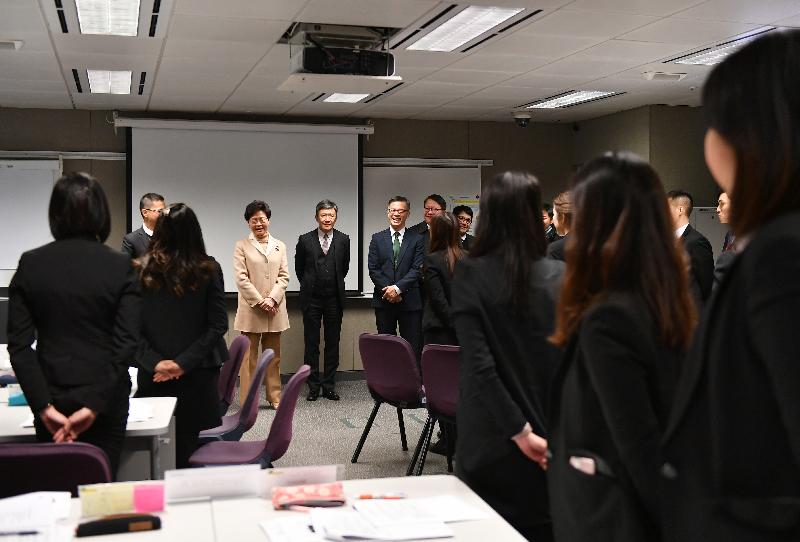 The Chief Executive, Mrs Carrie Lam, chats with new recruits at the ICAC Headquarters today (January 9).