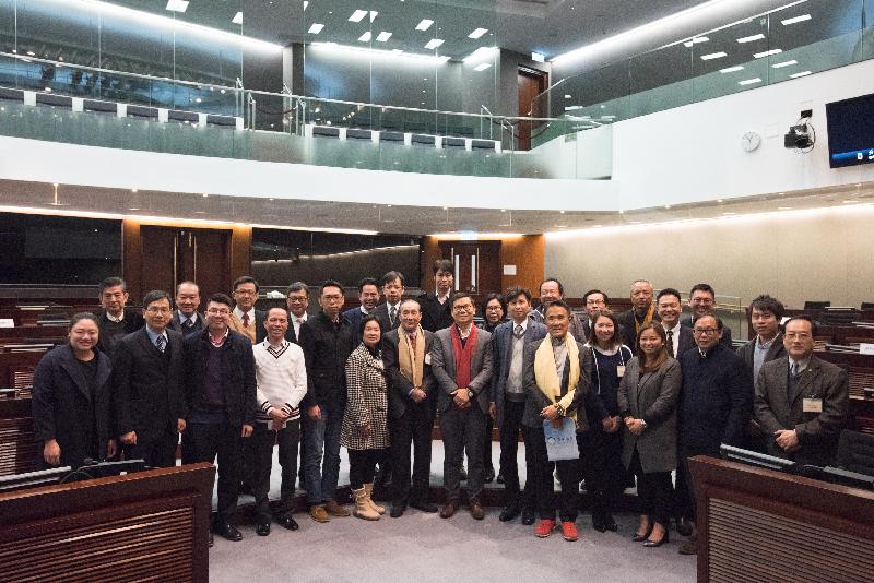 Members of the Legislative Council (LegCo) and Yuen Long District Council pictured after a meeting in the LegCo Complex today (January 12). 