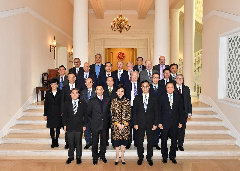 The Chief Executive, Mrs Carrie Lam (first row, centre); the Secretary for Education, Mr Kevin Yeung (first row, second right); the Chairman of the University Grants Committee (UGC), Mr Carlson Tong (first row, second left); and members of the UGC are pictured at Government House today (January 12).