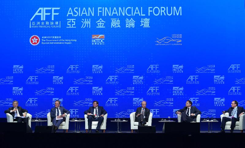 The Secretary for Financial Services and the Treasury, Mr James Lau (first left), moderates at a plenary session of the 11th Asian Financial Forum to exchange views with the Chair of the European Securities and Markets Authority, Mr Steven Maijoor (second left); the First Deputy Governor of the Bank of Russia, Mr Sergey Shvetsov (third left); the Chief Executive Officer of the Securities and Futures Commission and Chairman of the Board of the International Organization of Securities Commissions, Mr Ashley Alder (third right); the Minister of Finance of the Slovak Republic, Mr Peter Kažimír (second right); and the Senior Adviser on Legal Affairs to the State Counsellor of Myanmar, Daw Aung San Suu Kyi, Mr Robert San Pé (first right), on "Steering Growth and Pioneering Innovation: Regulatory Responses to Emerging Technologies and Innovations" today (January 15).