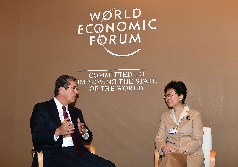 The Chief Executive, Mrs Carrie Lam, today (January 25, Davos time) continued to attend the World Economic Forum Annual Meeting in Davos, Switzerland. Photo shows Mrs Lam (right) meeting with the Director-General of the World Trade Organization, Mr Roberto Azevêdo (left), in the afternoon.