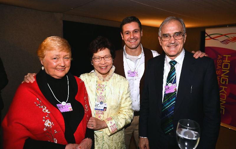 The Chief Executive, Mrs Carrie Lam, today (January 25, Davos time) continued to attend the World Economic Forum Annual Meeting in Davos, Switzerland. Photo shows Mrs Lam (second left) with the Co-Founders/Directors of Crossroads Foundation, Mr and Mrs Malcolm Begbie (first right and first left), at a cocktail reception hosted by her in the evening.