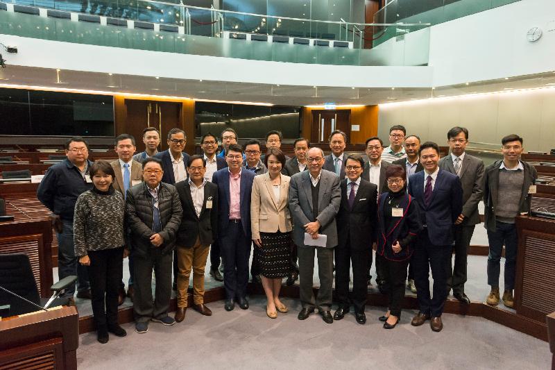 Members of the Legislative Council (LegCo) and the Tai Po District Council are pictured after a meeting held at the LegCo Complex today (January 26).
