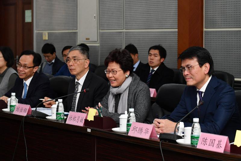 The Chief Executive, Mrs Carrie Lam (second right), meets the Vice-Chairman of the National Committee of the Chinese People's Political Consultative Conference and Minister of Science and Technology, Professor Wan Gang, in Beijing today (February 1). Also joining the meeting are the Secretary for Financial Services and the Treasury, Mr James Lau (second left); the Secretary for Commerce and Economic Development, Mr Edward Yau (first right); and the Secretary for Constitutional and Mainland Affairs, Mr Patrick Nip (first left).