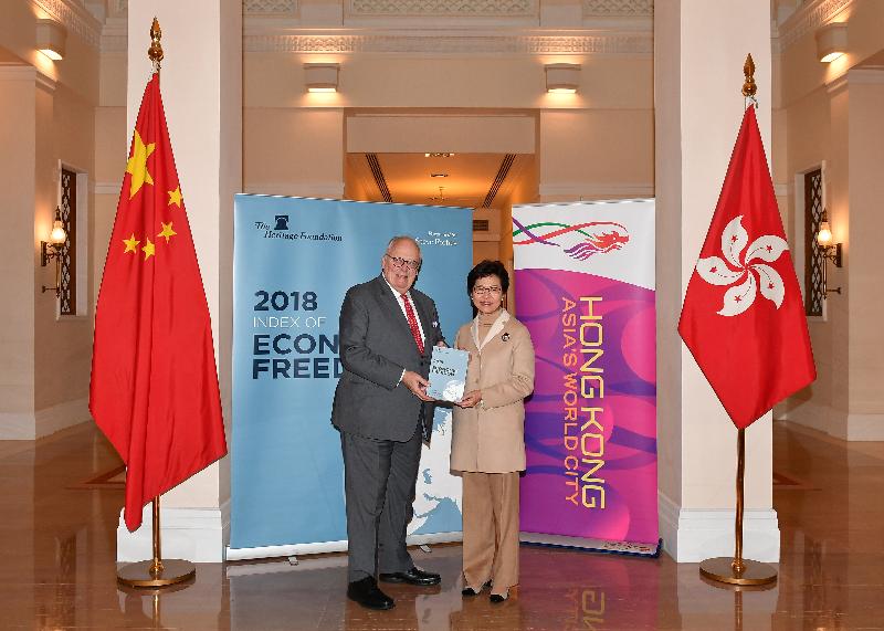 The Chief Executive, Mrs Carrie Lam (right), receives a copy of the Heritage Foundation's 2018 Index of Economic Freedom Report from its Founder, Dr Edwin Feulner, at Government House on January 31. Mrs Lam welcomed Hong Kong's ranking as the world's freest economy for 24 consecutive years since the Index of Economic Freedom report was first published in 1995.