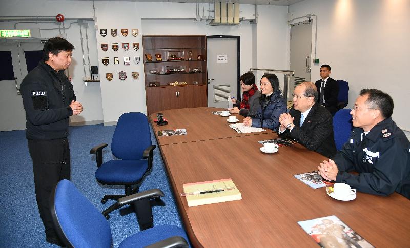 The Chief Secretary for Administration, Mr Matthew Cheung Kin-chung (second right), today (February 2) visits the Explosive Ordnance Disposal Bureau of the Hong Kong Police Force and receives a briefing from the Senior Bomb Disposal Officer, Mr Tony Chow (first left), on the bureau's work. Also present is the Deputy Commissioner of Police (Operations), Mr Lau Yip-shing (first right).