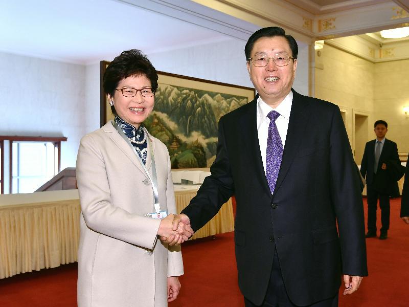 The Chief Executive, Mrs Carrie Lam (left), shakes hands with the Chairman of the Standing Committee of the National People's Congress, Mr Zhang Dejiang, before attending the Seminar on Strategies and Opportunities under the Belt and Road Initiative - Leveraging Hong Kong's Advantages, Meeting the Country's Needs held by the Government of the Hong Kong Special Administrative Region and the Belt and Road General Chamber of Commerce at the Great Hall of the People in Beijing today (February 3).