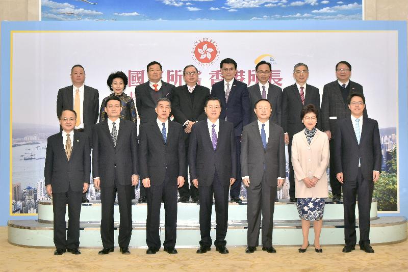 The Chief Executive, Mrs Carrie Lam, attended the Seminar on Strategies and Opportunities under the Belt and Road Initiative - Leveraging Hong Kong's Advantages, Meeting the Country's Needs held by the Government of the Hong Kong Special Administrative Region and the Belt and Road General Chamber of Commerce at the Great Hall of the People in Beijing today (February 3). Pictured before attending the Seminar are (front row, from left) the Director of the Liaison Office of the Central People's Government in the Hong Kong Special Administrative Region, Mr Wang Zhimin; the Chairman of the State-owned Assets Supervision and Administration Commission of the State Council, Mr Xiao Yaqing; State Councillor Wang Yong; the Chairman of the Standing Committee of the National People's Congress, Mr Zhang Dejiang; State Councillor Mr Yang Jiechi; Mrs Lam; the Director of the Hong Kong and Macao Affairs Office of the State Council, Mr Zhang Xiaoming; (back row, from left) Founders of the Belt and Road General Chamber of Commerce Mr Pan Sutong, Ms Cheng Cheung-ling and Mr Chanchai Ruayrungruang; the Council Chairman of the Belt and Road General Chamber of Commerce Dr Peter Lam; the Secretary for Commerce and Economic Development, Mr Edward Yau; the Secretary for Constitutional and Mainland Affairs, Mr Patrick Nip; the Secretary for Financial Services and the Treasury, Mr James Lau; and the Director of the Chief Executive's Office, Mr Chan Kwok-ki.