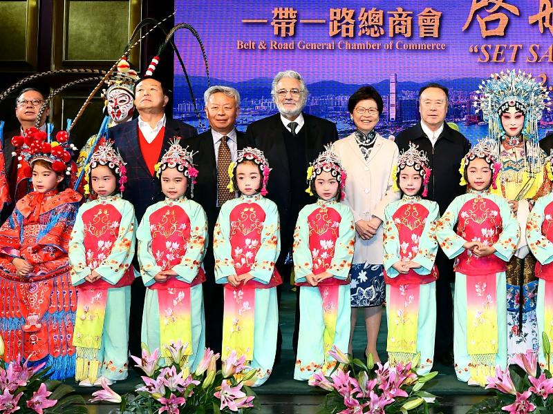 The Chief Executive, Mrs Carrie Lam, attended the Cultural Gala organised by the Belt and Road General Chamber of Commerce after the Seminar on Strategies and Opportunities under the Belt and Road Initiative - Leveraging Hong Kong's Advantages, Meeting the Country's Needs in Beijing this evening (February 3). Photo shows (back row, from left) the Council Chairman of the Belt and Road General Chamber of Commerce, Dr Peter Lam; Founder of the Belt and Road General Chamber of Commerce Mr Chanchai Ruayrungruang; the President and Chairman of the Asian Infrastructure Investment Bank, Mr Jin Liqun; renowned vocalist Plácido Domingo; Mrs Lam; former Vice Chairman of the National Committee of the Chinese People's Political Consultative Conference Mr Bai Lichen; and performers at the event. 