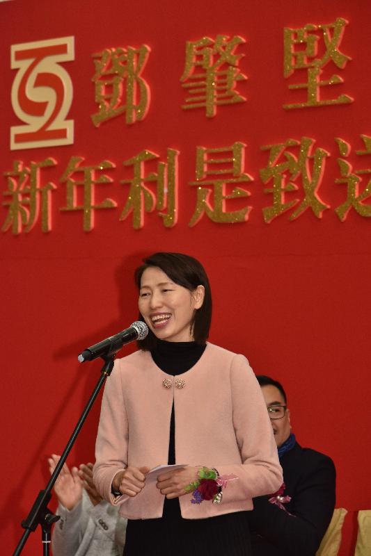 The Director of Social Welfare, Ms Carol Yip, speaks at the annual lai see packet distribution ceremony and Lunar New Year celebration party of the Tang Shiu Kin and Ho Tim Charitable Fund today (February 6). She wished all participants a healthy and happy new year.