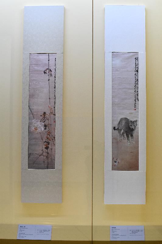 The "Porcelain and Painting" exhibition opened today (February 9) at the Chao Shao-an Gallery of the Hong Kong Heritage Museum. Photo shows joint works on paper by Chao Shao-an and Yang Shanshen, "Cat and Butterfly" (right) and "Rose and Bird" (left). (Private collection.)