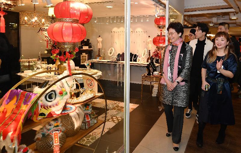 The Chief Executive, Mrs Carrie Lam (left), today (February 9) toured a modern landmark for creative design comprising two buildings converted under the Government's Scheme on Revitalisation of Industrial Buildings, D2 Place One and Two in Lai Chi Kok. Looking on is the Chairlady of Fashion Farm Foundation, Ms Edith Law (right).