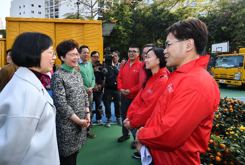The Chief Executive, Mrs Carrie Lam, inspected the clean-up work at the site of the Victoria Park Lunar New Year Fair this morning (February 16). Photo shows Mrs Lam (second left) and the Secretary for Food and Health, Professor Sophia Chan (first left) chatting with volunteer teams made up of Food and Environmental Hygiene Department staff.