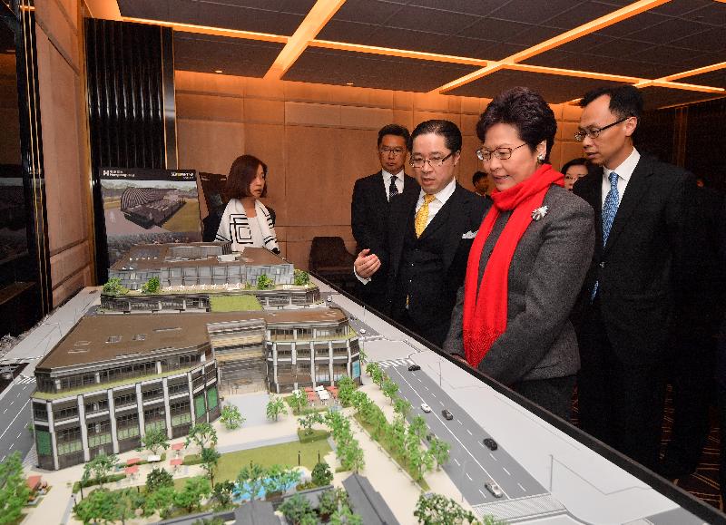 The Chief Executive, Mrs Carrie Lam, visited WF Central commercial development project in Wangfujing, Beijing, today (March 5). Photo shows Mrs Lam (second right); the Secretary for Constitutional and Mainland Affairs, Mr Patrick Nip (first right); receiving a briefing on the project from the Executive Director of Hongkong Land, Mr Raymond Chow (third left).