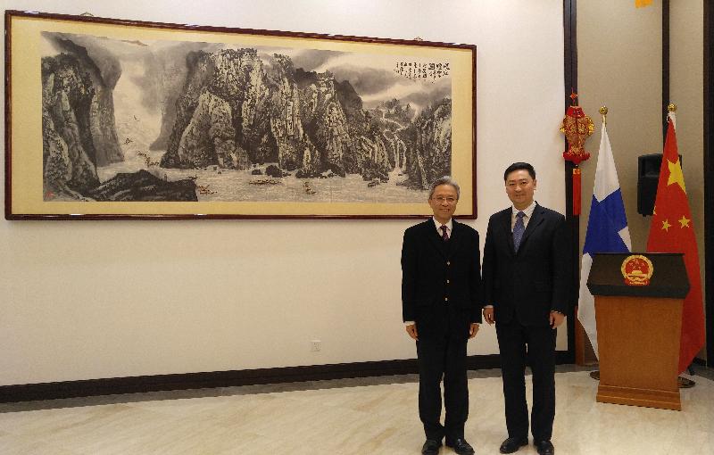 The Secretary for the Civil Service, Mr Joshua Law, started the first leg of his visit to Europe in Helsinki, Finland, on March 5 (Helsinki time) to get an update on the management and training of the civil service there. Photo shows Mr Law (left) paying a courtesy call on the Chinese Ambassador to Finland, Mr Chen Li (right).