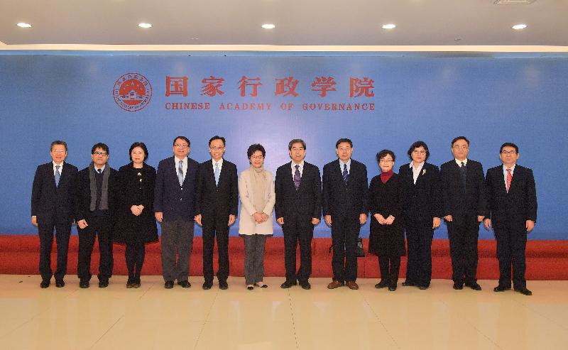 The Chief Executive, Mrs Carrie Lam, visited the Chinese Academy of Governance in Beijing today (March 6). Photo shows Mrs Lam (sixth left); the Executive Vice President of the Chinese Academy of Governance, Mr Ma Jiantang (seventh left); the Secretary for Constitutional and Mainland Affairs, Mr Patrick Nip (fifth left); the Director of the Chief Executive's Office, Mr Chan Kwok-ki (fourth left); the Director of the Office of the Hong Kong Special Administrative Region Government in Beijing, Ms Gracie Foo (third left); and other participants at the Academy.
