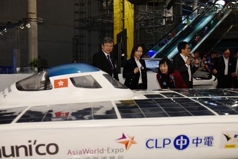 The opening ceremony for the "SOPHIE - IVE's Solar Cars Driving the Future" exhibition was held today (March 12) at the Hong Kong Science Museum. Photo shows officiating guests touring the exhibition including (from left) the Vocational Training Council Deputy Executive Director, Dr Eric Liu; the Museum Director of the Hong Kong Science Museum, Ms Paulina Chan; and the Director of Leisure and Cultural Services, Ms Michelle Li.