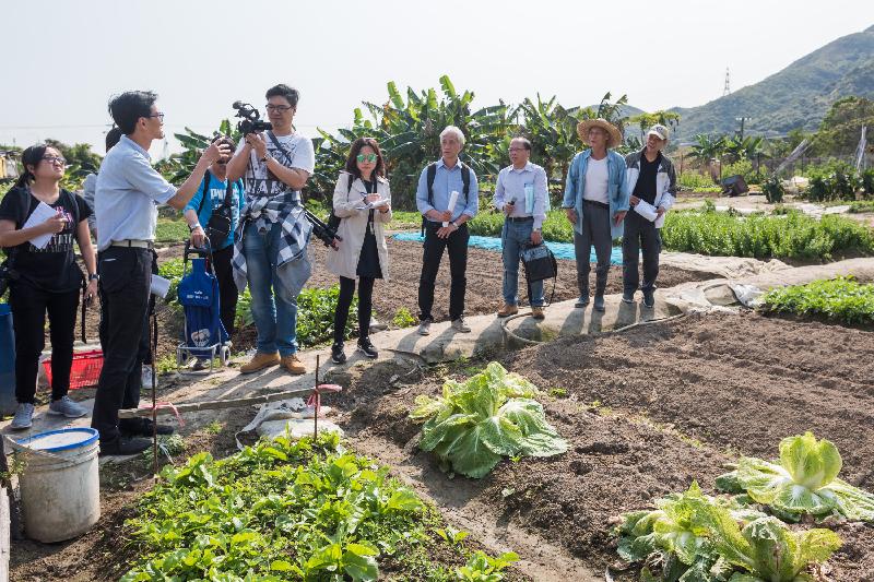 Members of the Legislative Council observe the agricultural land at Tin Sam San Tsuen today (March 12) to understand the impacts of the Hung Shui Kiu New Development Area project on the local farmers and households.