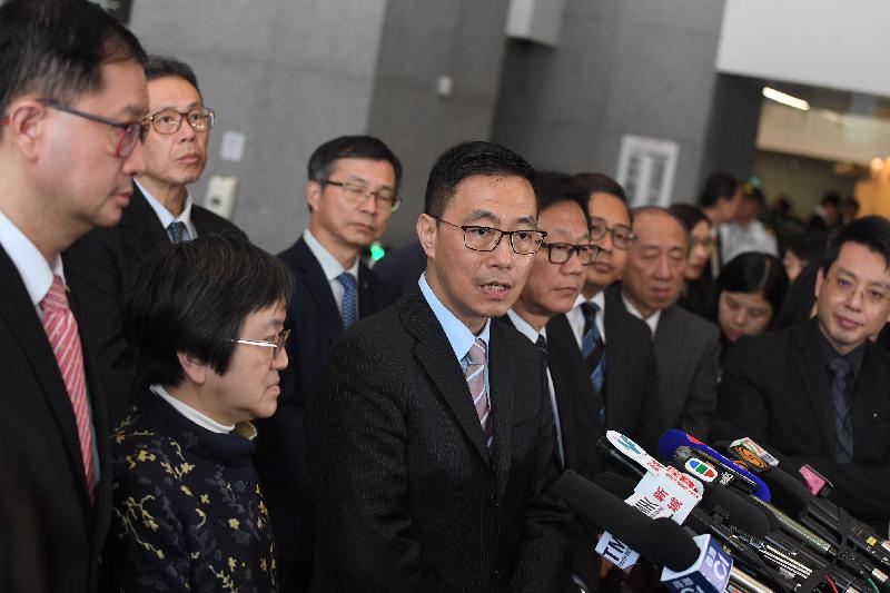The Secretary for Education, Mr Kevin Yeung (front row, third left), meets the media after attending a meeting of the Coordinating Committee on Basic Competency Assessment and Assessment Literacy today (Match 16).
