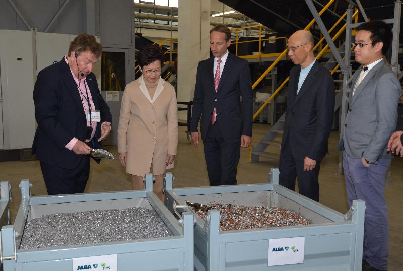 The Chief Executive, Mrs Carrie Lam, attended the opening ceremony for the Waste Electrical and Electronic Equipment Treatment and Recycling Facility, WEEE·PARK, today (March 19). Photo shows Mrs Lam (second left) and the Secretary for the Environment, Mr Wong Kam-sing (second right), touring the facility.