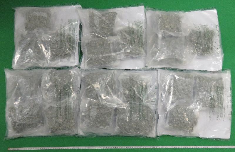 Hong Kong Customs seized about 5.4 kilograms of suspected cannabis buds with an estimated market value of about $970,000 at a mail processing centre of Hongkong Post in Tuen Mun on March 15. 