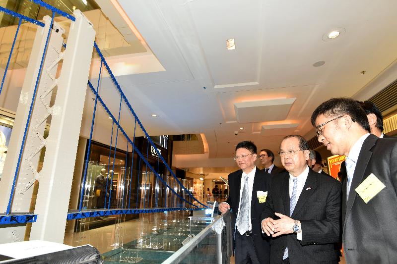 The Chief Secretary for Administration, Mr Matthew Cheung Kin-chung, tours the "Exhibition of World's Longest Span Bridge with LEGO Bricks" today (March 21).