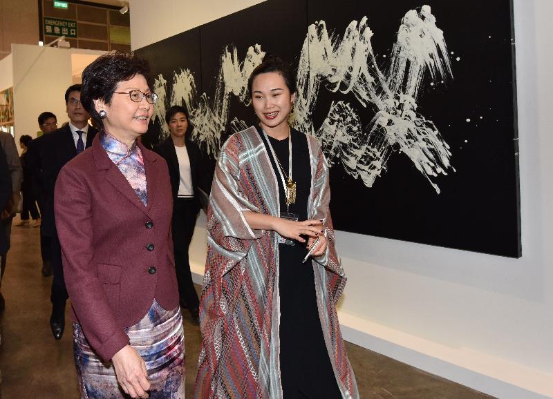 The Chief Executive, Mrs Carrie Lam, attended the Art Basel Hong Kong opening ceremony today (March 27). Photo shows Mrs Lam (left) touring the exhibition.