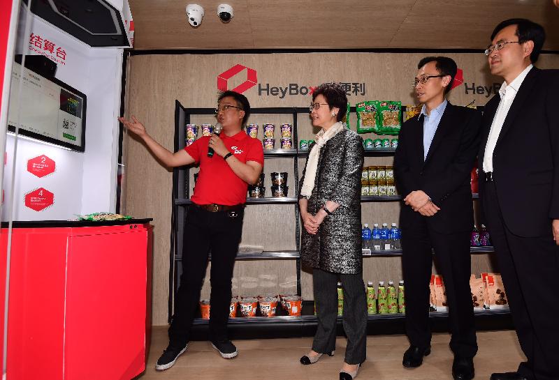 The Chief Executive, Mrs Carrie Lam, visited the National Health Technology Park in Zhongshan today (March 29). Photo shows Mrs Lam (second left) and the Secretary for Constitutional and Mainland Affairs, Mr Patrick Nip (second right) receiving a briefing on a convenience store operated with artificial intelligence.