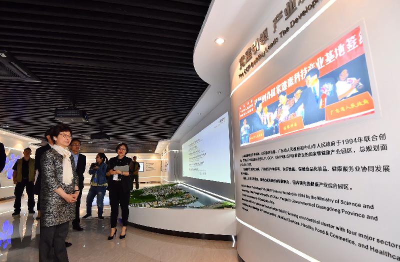 The Chief Executive, Mrs Carrie Lam, visited the National Health Technology Park in Zhongshan today (March 29). Photo shows Mrs Lam (left) receiving a briefing by the General Manager of the Park, Ms Fang Ying (right).