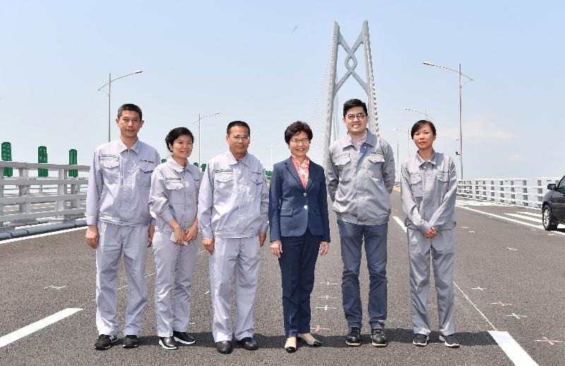 The Chief Executive, Mrs Carrie Lam, visited the Hong Kong-Zhuhai-Macao Bridge in Zhuhai today (March 30). Photo shows Mrs Lam (third right) with representatives of Hong Kong-Zhuhai-Macao Bridge Authority.