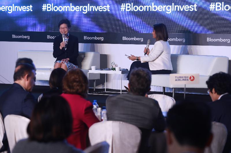 The Chief Executive, Mrs Carrie Lam (left), answers questions at the Bloomberg Invest Asia Summit today (April 11).
