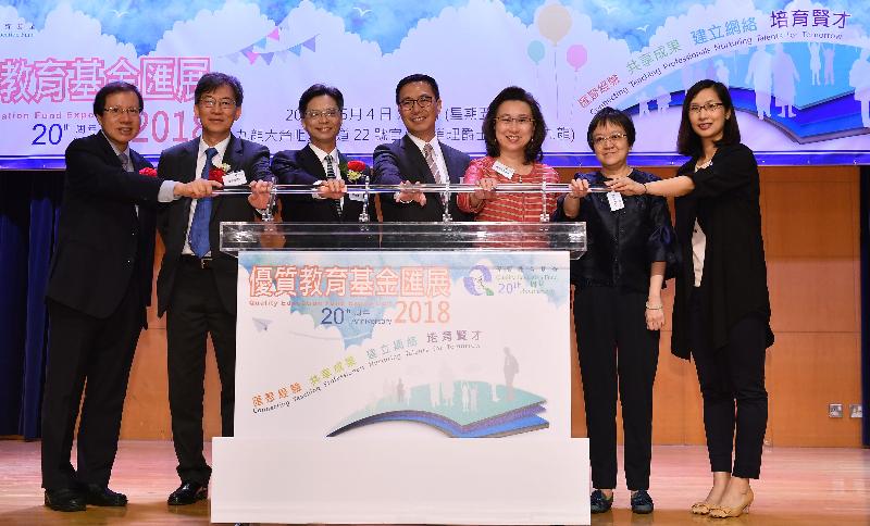 The Secretary for Education, Mr Kevin Yeung (fourth left), and the Chairman of the Quality Education Fund, Dr Tsui Luen-on (third left), officiate at the opening and prize presentation ceremony of the Quality Education Fund Exposition 2018 today (May 4). Other officiating guests include the Permanent Secretary for Education, Mrs Ingrid Yeung (third right); the Deputy Secretary for Education, Mrs Hong Chan Tsui-wah (second right); Principal Assistant Secretary of the Education Bureau Ms Jenny Chan (first right); the Chairman of the Quality Education Fund Dissemination and Promotion Sub-committee, Dr Mak Chi-keung (first left); and the Chairman of the Quality Education Fund Assessment and Monitoring Sub-committee, Dr Brian Lo (second left).