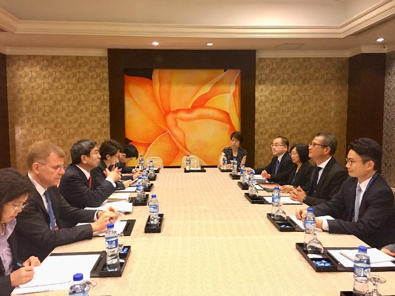 The Financial Secretary, Mr Paul Chan (second right), today (May 5) met with the President of the Asian Development Bank (ADB) and Chairperson of the ADB's Board of Directors, Mr Takehiko Nakao (third left), during the 51st Annual Meeting of the ADB in Manila, the Philippines. The Under Secretary for Financial Services and the Treasury, Mr Joseph Chan (first right), and the Director-General of the Hong Kong Economic and Trade Office in Jakarta, Mrs Do Pang Wai-yee (third right), also attended. 