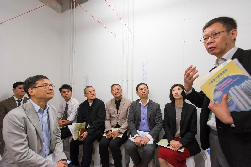 Legislative Council Members today (May 8) receive a briefing by a representative of a social welfare service unit on its assistance offered to residents of On Tai Estate in Kwun Tong in their relocation and adaptation to the new community.