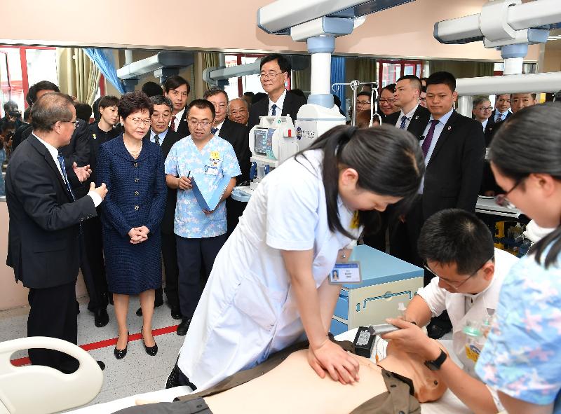  The Chief Executive, Mrs Carrie Lam (second left), visits the Sichuan University-The Hong Kong Polytechnic University Institute for Disaster Management and Reconstruction in Chengdu this afternoon (May 11).