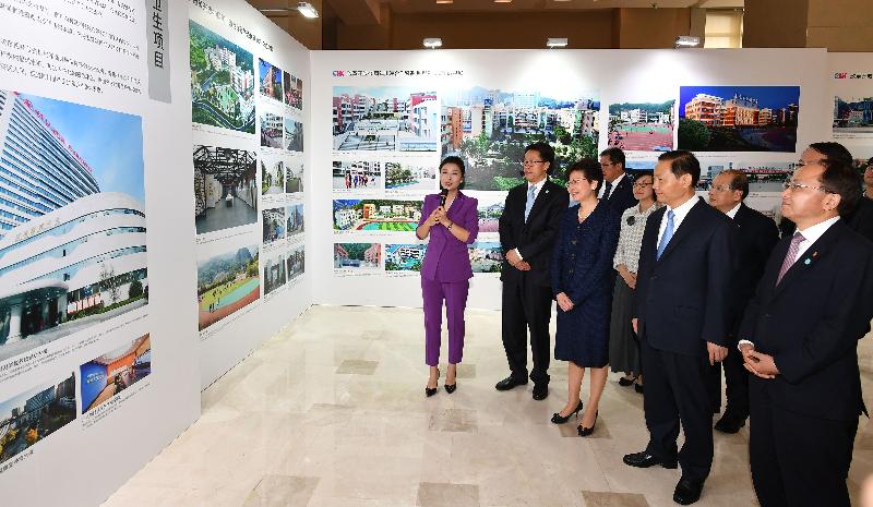 The Chief Executive, Mrs Carrie Lam (third left), attends an exhibition on the 40th anniversary of the reform and opening up, HK-Sichuan co-operation and 10th anniversary of HK's post-earthquake reconstruction support work in Sichuan in Chengdu today (May 11). Also pictured are the Chief Secretary for Administration, Mr Matthew Cheung Kin-chung (second right); the Secretary for Food and Health, Professor Sophia Chan (fifth left); the Secretary for Development, Mr Michael Wong (fourth left); the Secretary of the CPC Sichuan Provincial Committee, Mr Peng Qinghua (third right); the Director of the Hong Kong and Macao Affairs Office of the State Council, Mr Zhang Xiaoming (second left); and the Director of the Liaison Office of the Central People's Government in the Hong Kong Special Administrative Region, Mr Wang Zhimin (first right).