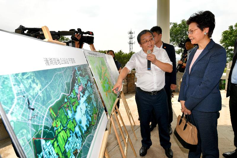 The Chief Executive, Mrs Carrie Lam, today (May 16) visited Tonghu Ecological and Smart Zone under planning in Huizhou. Photo shows Mrs Lam (first right) receiving a briefing on the general planning of the zone. 
