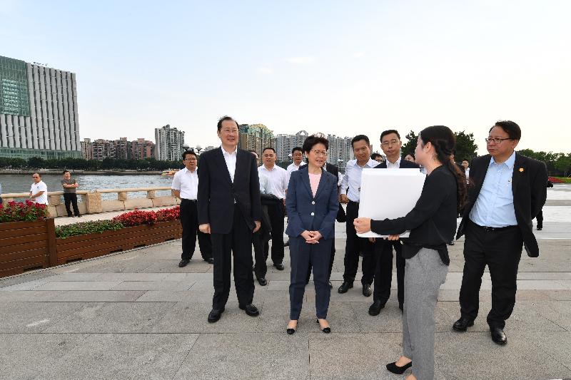 The Chief Executive, Mrs Carrie Lam (fifth left), today (May 16) visited Ershadao Art Park in Guangzhou. Photo shows Mrs Lam accompanied by the Secretary of the CPC Guangzhou Municipal Committee, Mr Ren Xuefeng (second left), receiving a briefing on the city development of Guangzhou.