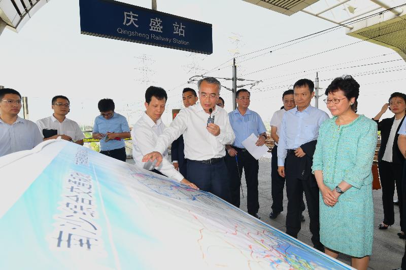 The Chief Executive, Mrs Carrie Lam, visited the Nansha Qingsheng high-speed rail station today (May 17). Photo shows Mrs Lam (second right) being briefed by the member of the Standing Committee, CPC Guangzhou Committee, and Secretary of the CPC Guangzhou Nansha District Committee, Mr Cai Chaolin (sixth left), on the area's transportation network and the surrounding development.