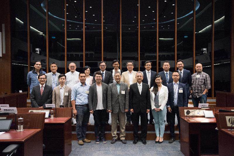 Members of the Legislative Council (LegCo) and Tsuen Wan District Council pictured after a meeting in the LegCo Complex today (May 25).