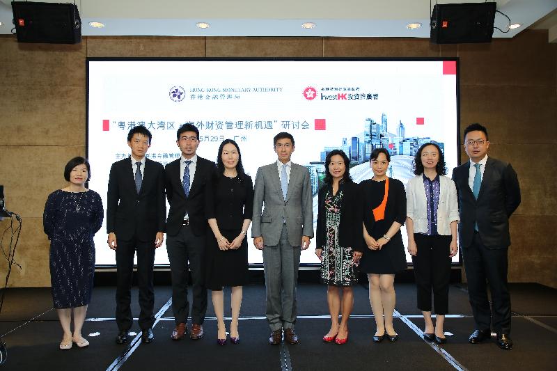 The Hong Kong Monetary Authority (HKMA) and Invest Hong Kong (InvestHK) jointly hosted a seminar on overseas treasury management in Guangzhou today (May 29) to promote the advantages of establishing Corporate Treasury Centres and conducting financing activities in Hong Kong to corporations in Guangdong Province. Photo shows (from left) the Head of the Guangdong Investment Promotion Unit of InvestHK, Ms Winifred Ho; Senior Manager of the Market Development Division of the HKMA, Mr Kenneth Hui; the Director of International Tax Services of Deloitte China, Mr Roy Phan; the Director of the Capital Account Management Division of the State Administration of Foreign Exchange, Guangdong Branch, Ms He Zhiqun; the Executive Director (External) of the HKMA, Mr Vincent Lee; the Acting Associate Director-General of Investment Promotion of InvestHK, Ms Loretta Lee; Senior Manager of the Market Development Division of the HKMA, Ms Sara Yip; the General Manager of the Transaction Banking Department of Bank of China (Hong Kong) Limited, Ms Teng Linhui; and the Head of Debt Capital Markets of Bank of China (Hong Kong) Limited, Mr Alex Chen.