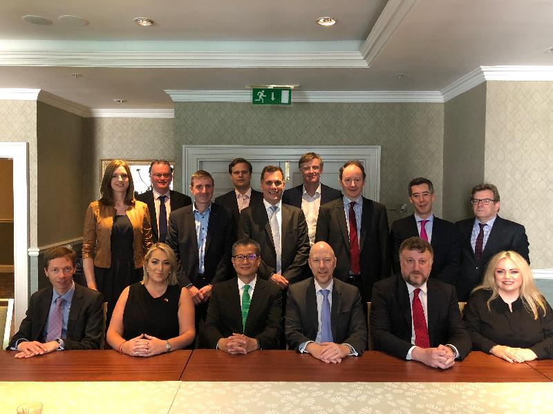 The Financial Secretary, Mr Paul Chan (first row, third left), meets with representatives of a group of Irish Fintech companies already operating in Hong Kong or looking to establish offices in Hong Kong today (May 31, Dublin time) in Dublin, Ireland.