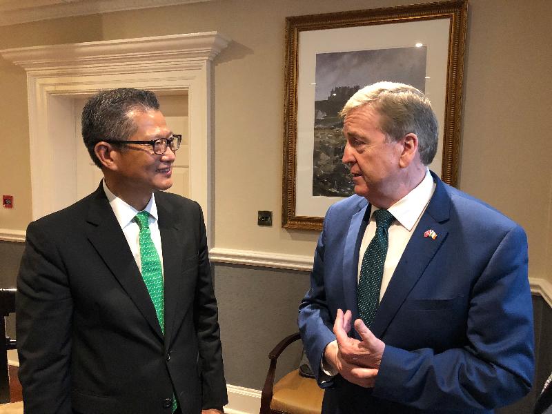 The Financial Secretary, Mr Paul Chan attended the "Routes to Growth: Creating Opportunities Between Hong Kong and Ireland as Financial Services & Aviation Hubs" seminar organised by Invest Hong Kong and Enterprise Ireland today (May 31, Dublin time) in Dublin, Ireland. Photo shows Mr Chan (left) meeting with the Minister of State for Trade, Employment, Business, EU Digital Single Market and Data Protection of Ireland, Mr Pat Breen (right).
