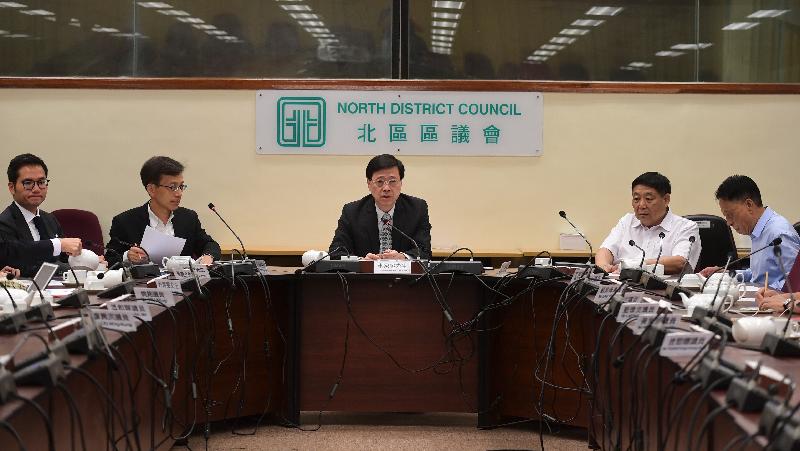 During his visit to North District this afternoon (June 1), the Secretary for Security, Mr John Lee (centre), accompanied by the District Officer (North), Mr Chong Wing-wun  (second left), meets with the Chairman of the North District Council, Mr So Sai-chi (second right), and other District Council members to exchange views on law and order matters and other issues relating to people's livelihood in the district.