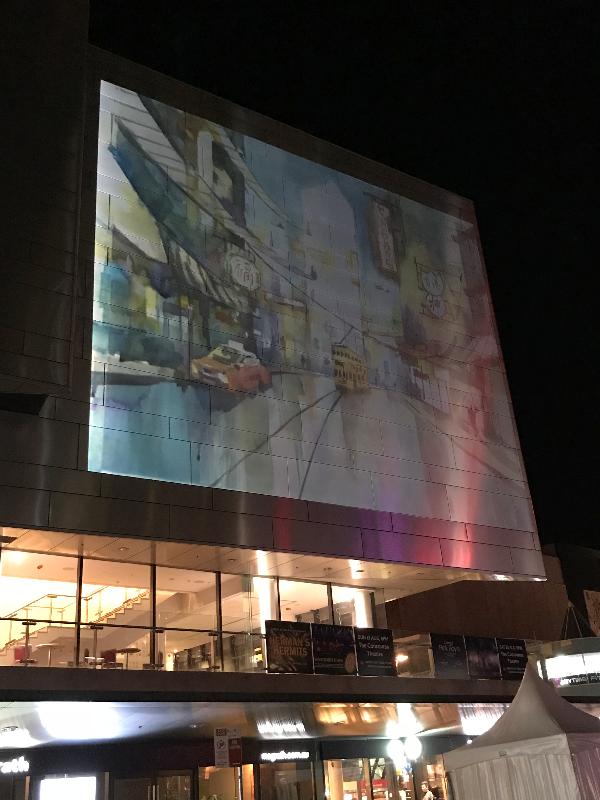 With the support of the Hong Kong Economic and Trade Office, Sydney, young Hong Kong watercolour artist Elaine Chiu has been painting pictures of future cities and space live for spectators at a Vivid Sydney event in the Chatswood district of Sydney, Australia. Photo shows a painting by Chiu being projected live onto the Concourse in Chatswood.