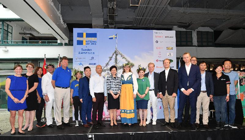 The Chief Executive, Mrs Carrie Lam, attended the Swedish Midsummer and National Day Celebration today (June 8). Mrs Lam (ninth left) is pictured with the Consul General of Sweden in Hong Kong, Ms Helena Storm (10th left), and other guests.