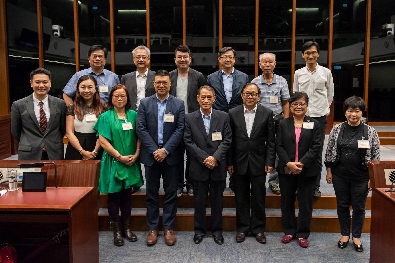 Members of the Legislative Council (LegCo) and the Islands District Council in a group photo after a meeting held in the LegCo Complex today (June 8).