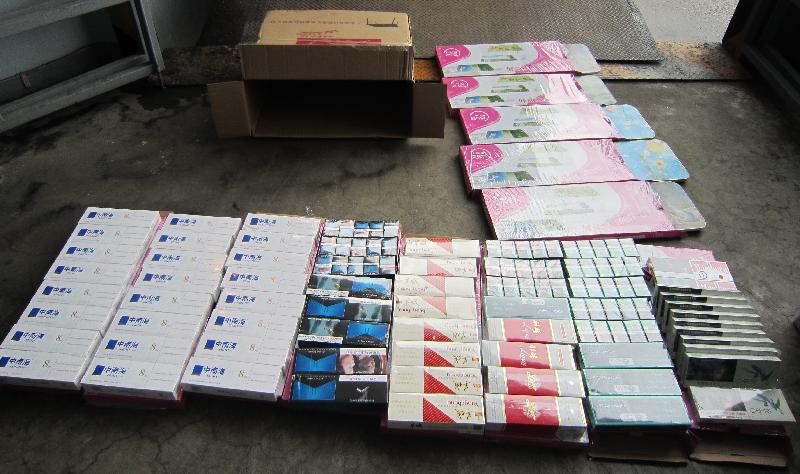 Hong Kong Customs today (June 13) seized about 200 000 suspected illicit cigarettes with an estimated market value of about $500,000 and a duty potential of about $400,000 at Man Kam To Control Point. Photo shows some of the suspected illicit cigarettes seized.